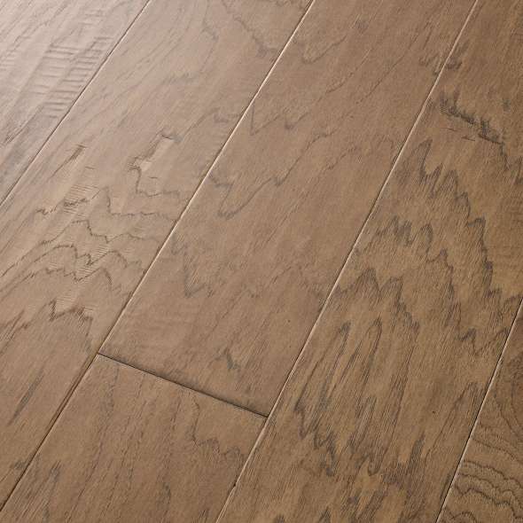 Pebble Hill Hickory, which warms rooms with its rich grain and hand-scraped texture, has proven so popular we've added another width plus three new colors. Hickory has inherent strength and durability, which make Pebble Hill a fantastic flooring choice. Made in the USA.
