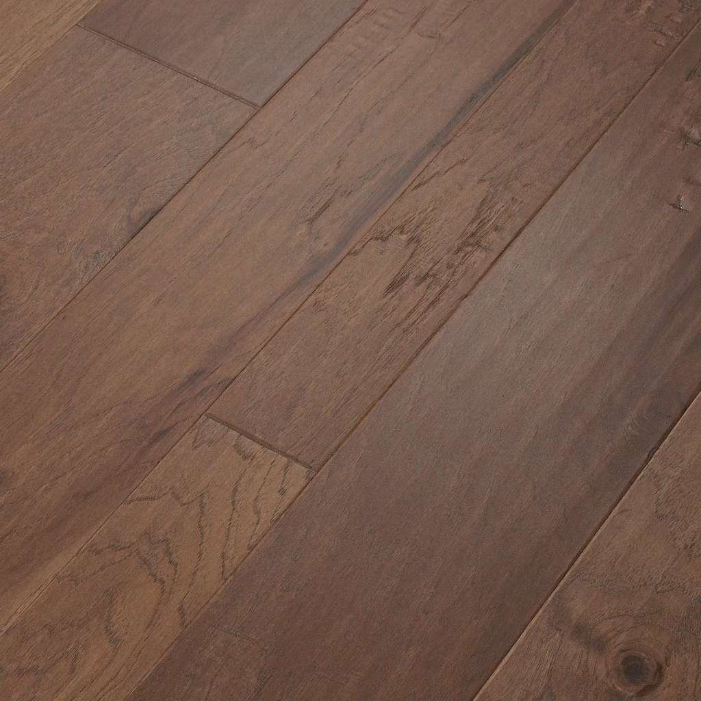 Light, natural tones and visible knots and splits create an unrefined look that illustrates the beauty of wood’s imperfection.