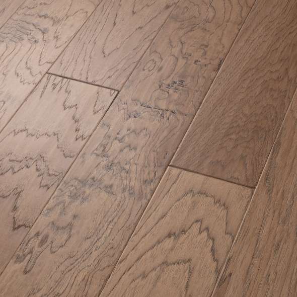 Pebble Hill Hickory, which warms rooms with its rich grain and hand-scraped texture, has proven so popular we've added another width plus three new colors. Hickory has inherent strength and durability, which make Pebble Hill a fantastic flooring choice. Made in the USA.