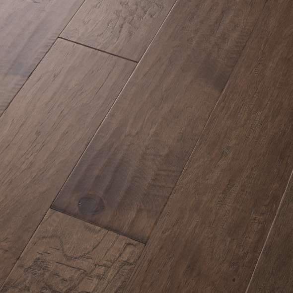 Pebble Hill Hickory, which warms rooms with its rich grain and hand-scraped texture, has proven so popular we've added another width plus three new colors. Hickory has inherent strength and durability, which make Pebble Hill a fantastic flooring choice. Made in the USA.